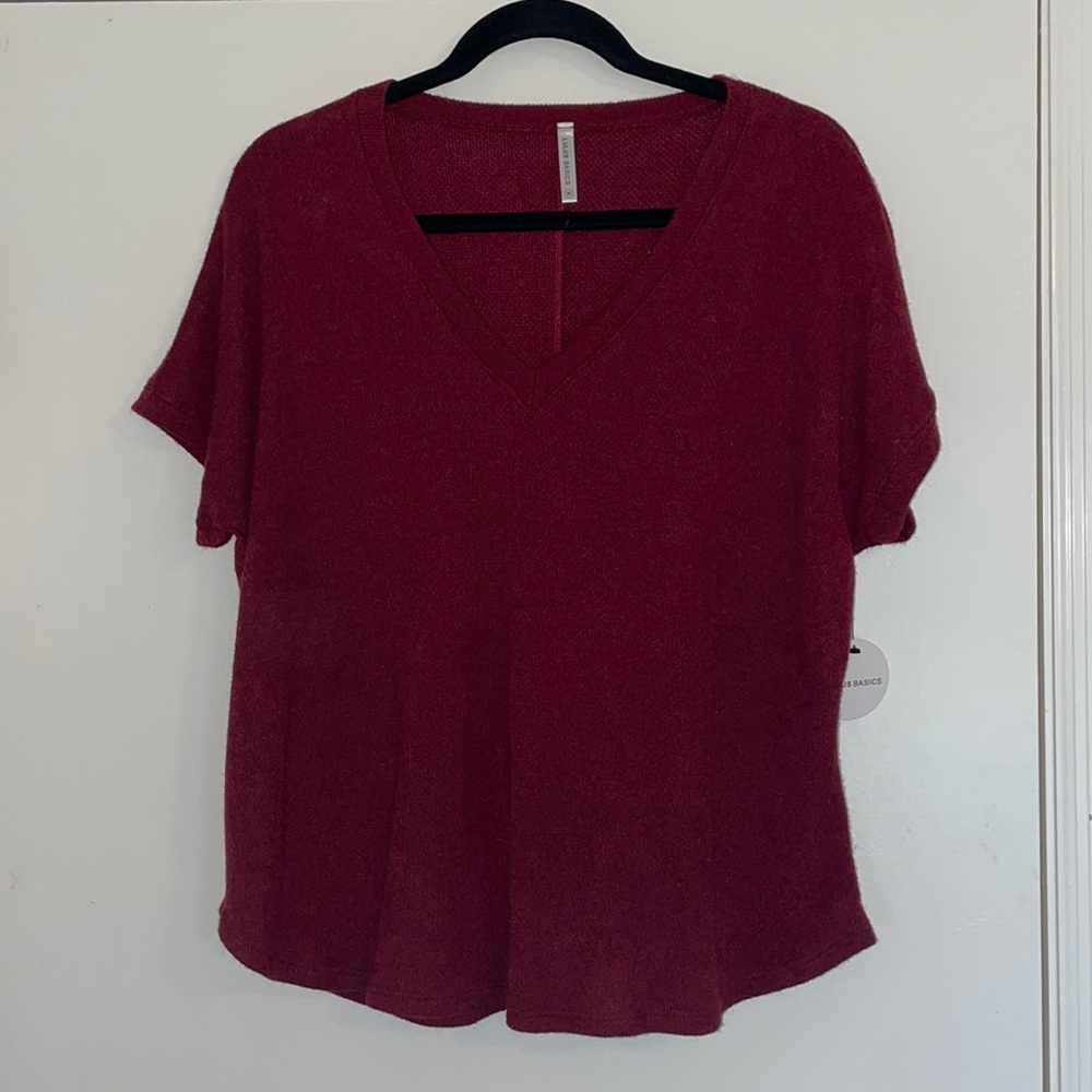 Maroon domain top. Sweater like material NWT